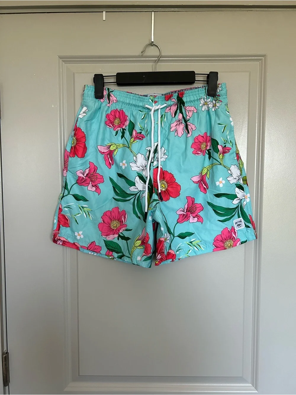 Men's Turquoise Floral Swim Trunks with Pink Flower Print